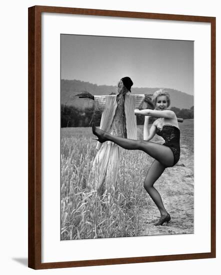 Actress and Dancer Julie Newmar Warming Up for Her Devil's Role in the Musical "Damn Yankees"-Nina Leen-Framed Premium Photographic Print