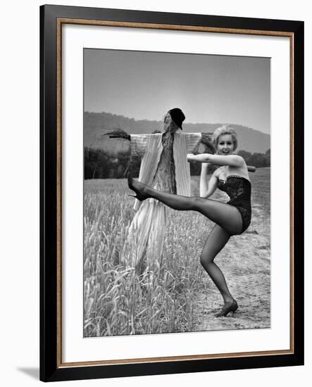 Actress and Dancer Julie Newmar Warming Up for Her Devil's Role in the Musical "Damn Yankees"-Nina Leen-Framed Premium Photographic Print