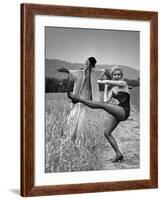 Actress and Dancer Julie Newmar Warming Up for Her Devil's Role in the Musical "Damn Yankees"-Nina Leen-Framed Premium Photographic Print