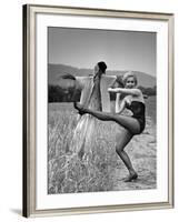 Actress and Dancer Julie Newmar Warming Up for Her Devil's Role in the Musical "Damn Yankees"-Nina Leen-Framed Premium Photographic Print