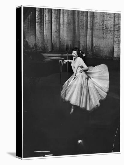 Actress and Singer Judy Garland Twirling Into a Dance Step During a Performance at the Palladium-Cornell Capa-Stretched Canvas