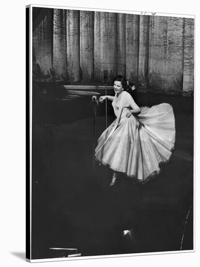 Actress and Singer Judy Garland Twirling Into a Dance Step During a Performance at the Palladium-Cornell Capa-Stretched Canvas