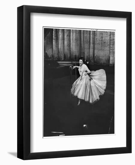 Actress and Singer Judy Garland Twirling Into a Dance Step During a Performance at the Palladium-Cornell Capa-Framed Photographic Print