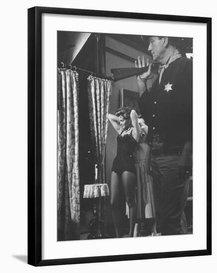 Actress Angie Dickinson During Dress Rehearsal of "Rio Bravo" with Actor John Wayne-Allan Grant-Framed Premium Photographic Print