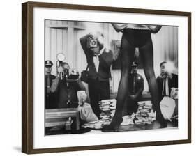 Actress Angie Dickinson's Lower Half Straddling a Million Dollars in Fake Money-John Dominis-Framed Premium Photographic Print