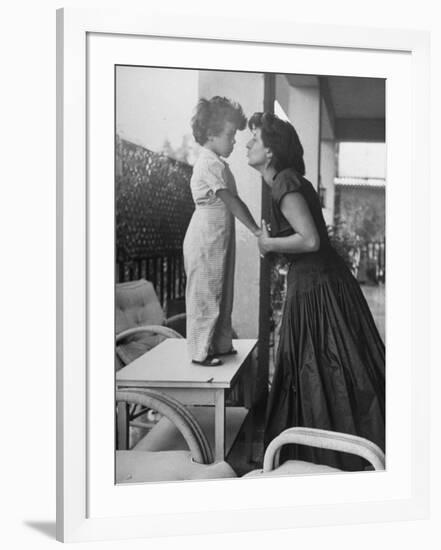 Actress Anna Magnani Posing with Child Standing on Table-null-Framed Premium Photographic Print