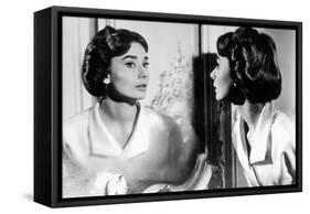 Actress Audrey Hepburn Looking at Her Reflection in the Mirror January 16, 1957-null-Framed Stretched Canvas