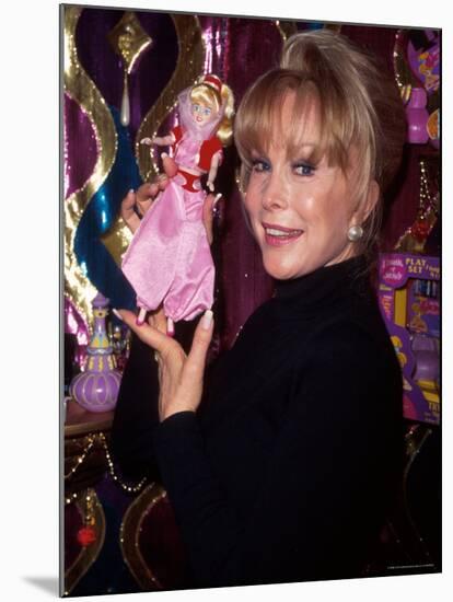 Actress Barbara Eden Holding Up Jeannie Doll-Dave Allocca-Mounted Premium Photographic Print