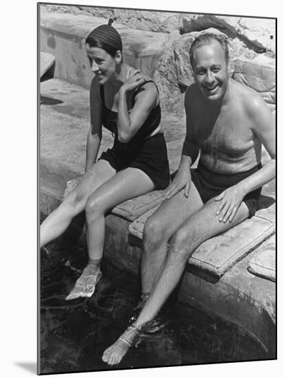 Actress Beatrice Lillie and Comedian Jack Benny Relaxing by the Pool on the French Riviera-John Phillips-Mounted Premium Photographic Print