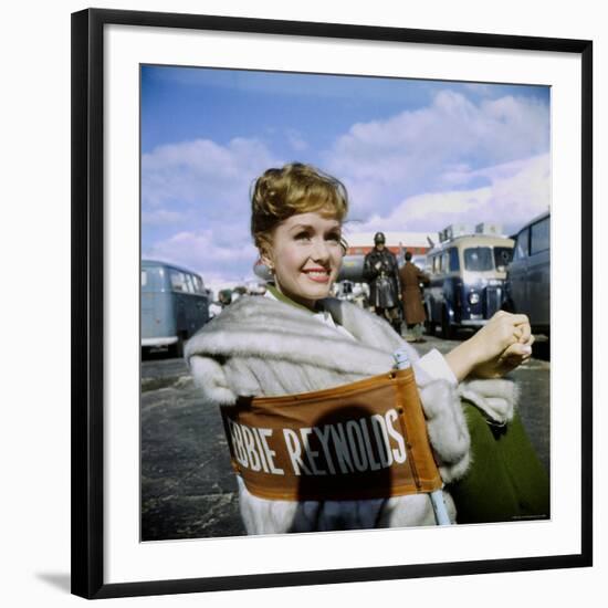 Actress Debbie Reynolds at Airport During Filming of "It Started with a Kiss"-Loomis Dean-Framed Premium Photographic Print