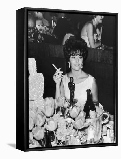 Actress Elizabeth Taylor at Hollywood Party After Winning Oscar, Which is on Table in Front of Her-Allan Grant-Framed Stretched Canvas