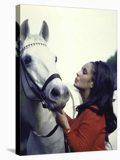 Actress Elizabeth Taylor with Horse During Filming of "Reflections in a Golden Eye"-Loomis Dean-Stretched Canvas