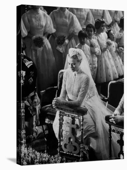 Actress Grace Kelly in Gorgeous Wedding Gown Praying During Her Wedding to Prince Rainier-Thomas D^ Mcavoy-Stretched Canvas