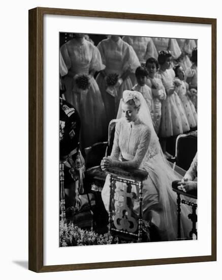 Actress Grace Kelly in Gorgeous Wedding Gown Praying During Her Wedding to Prince Rainier-Thomas D^ Mcavoy-Framed Premium Photographic Print