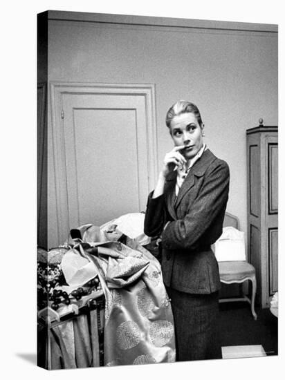 Actress Grace Kelly Packing Clothing Prior to Her Wedding to Prince Rainier-Lisa Larsen-Stretched Canvas