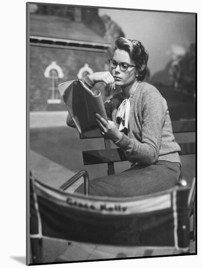 Actress Grace Kelly Studying Script for Her Role of Georgie in "The Country Girl" on movie set-Ed Clark-Mounted Photographic Print