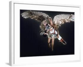 Actress Jane Fonda Being Carried by Guardian Angel in a Scene from Roger Vadim's Film "Barbarella"-Carlo Bavagnoli-Framed Premium Photographic Print