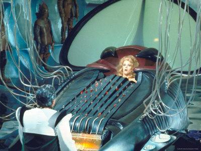 https://imgc.allpostersimages.com/img/posters/actress-jane-fonda-trapped-in-machine-which-kills-during-scene-from-roger-vadim-s-barbarella_u-L-P43C7Z0.jpg?artPerspective=n