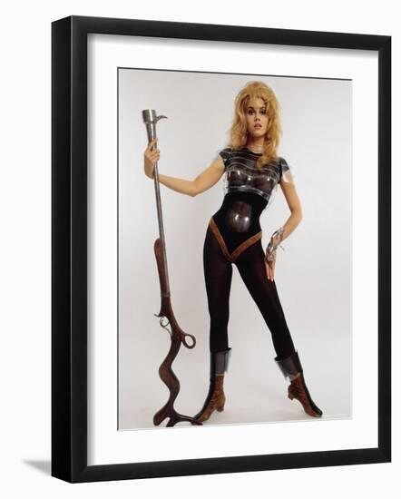 Actress Jane Fonda Wearing Space Age Costume for Title Role in Roger Vadim's Film "Barbarella"-Carlo Bavagnoli-Framed Premium Photographic Print