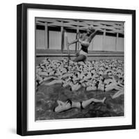 Actress Jayne Mansfield Posing with Shaped Hot Water Bottles Floating around Her at Her Pool-Allan Grant-Framed Premium Photographic Print