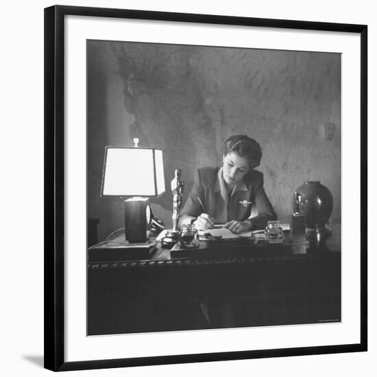 Actress Joan Fontaine Doing the Household Bookkeeping Next to Oscar Statuette-Bob Landry-Framed Premium Photographic Print