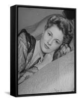 Actress Joan Fontaine Wearing Sheer Negligee While Lounging on Bed at Home-Bob Landry-Framed Stretched Canvas