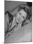 Actress Joan Fontaine Wearing Sheer Negligee While Lounging on Bed at Home-Bob Landry-Mounted Premium Photographic Print