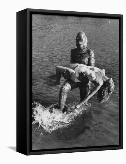 Actress Julia Adams is Carried by Monster, Gill Man, in the Movie, Creature from the Black Lagoon-Ed Clark-Framed Stretched Canvas