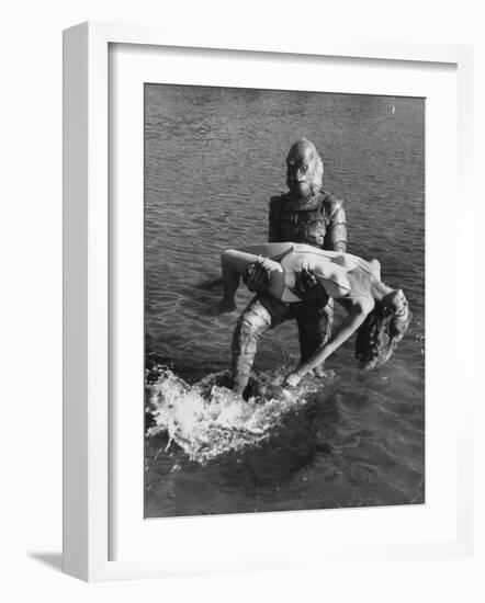 Actress Julia Adams is Carried by Monster, Gill Man, in the Movie, Creature from the Black Lagoon-Ed Clark-Framed Premium Photographic Print