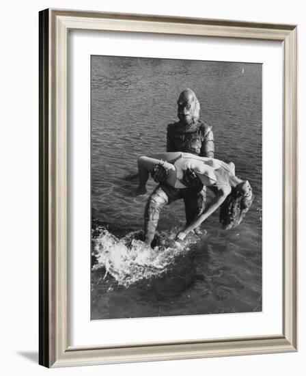 Actress Julia Adams is Carried by Monster, Gill Man, in the Movie, Creature from the Black Lagoon-Ed Clark-Framed Premium Photographic Print