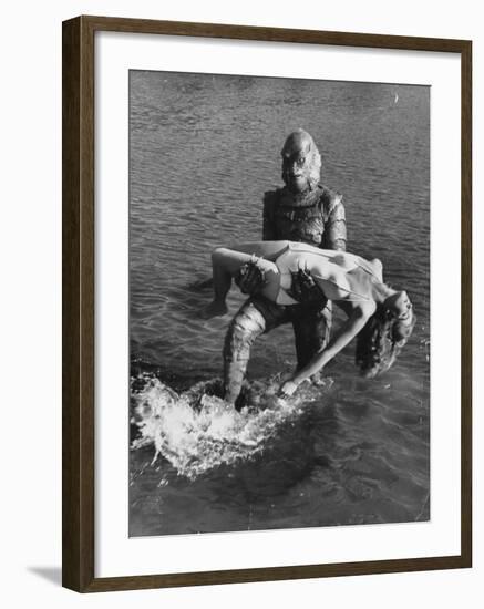 Actress Julia Adams is Carried by Monster, Gill Man, in the Movie, Creature from the Black Lagoon-Ed Clark-Framed Premium Photographic Print