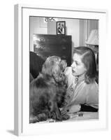 Actress Lauren Bacall Chatting with Her Cocker Spaniel Dog in Her Suite at Gotham Hotel-Nina Leen-Framed Premium Photographic Print