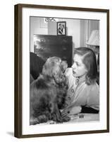 Actress Lauren Bacall Chatting with Her Cocker Spaniel Dog in Her Suite at Gotham Hotel-Nina Leen-Framed Premium Photographic Print