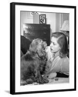 Actress Lauren Bacall Chatting with Her Cocker Spaniel Dog in Her Suite at Gotham Hotel-Nina Leen-Framed Premium Photographic Print