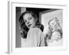 Actress Lauren Bacall Posing in Front of Portrait Drawing of Herself in Suite at the Gotham Hotel-Nina Leen-Framed Premium Photographic Print