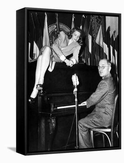 Actress Lauren Bacall Sits Atop the Piano While Vice President Harry Truman Plays-null-Framed Stretched Canvas