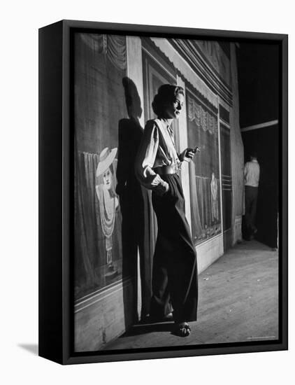 Actress Lauren Bacall Smoking a Cigarette on the Set of Film, "Young Man with a Horn"-Alfred Eisenstaedt-Framed Stretched Canvas