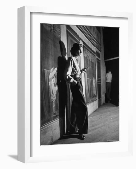 Actress Lauren Bacall Smoking a Cigarette on the Set of Film, "Young Man with a Horn"-Alfred Eisenstaedt-Framed Premium Photographic Print