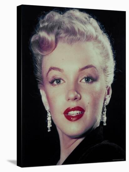 Actress Marilyn Monroe Wearing Dangling Rhinestone Earrings, with Her Hair Up-Ed Clark-Stretched Canvas