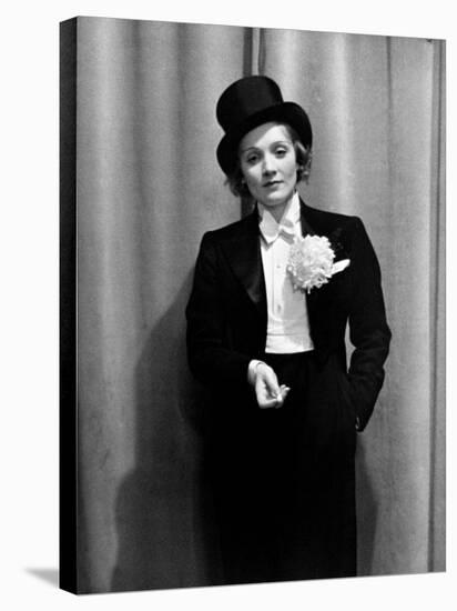 Actress Marlene Dietrich Wearing Tuxedo, Top Hat, Corsage and Holding Cigarette, Foreign Press Ball-Alfred Eisenstaedt-Stretched Canvas