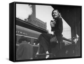 Actress Patricia Neal Sitting on Her Luggage on the Platform of a Train Station During a Stopover-Ed Clark-Framed Stretched Canvas