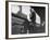 Actress Patricia Neal Sitting on Her Luggage on the Platform of a Train Station During a Stopover-Ed Clark-Framed Premium Photographic Print