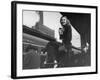 Actress Patricia Neal Sitting on Her Luggage on the Platform of a Train Station During a Stopover-Ed Clark-Framed Premium Photographic Print