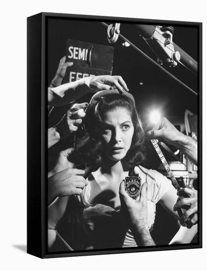 Actress Pier Angeli, Surrounded by Hands From Hair Stylist, Dresser, and Cameraman on MGM Movie Set-Allan Grant-Framed Stretched Canvas