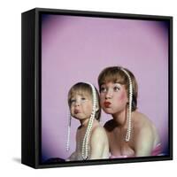 Actress Shirley MacLaine and Daughter Sachi Parker Pouting with String of Pearls on Their Heads-Allan Grant-Framed Stretched Canvas