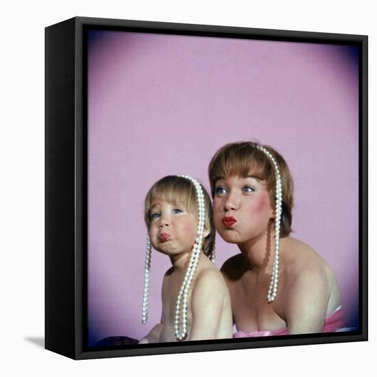 Actress Shirley MacLaine and Daughter Sachi Parker Pouting with String of Pearls on Their Heads-Allan Grant-Framed Stretched Canvas