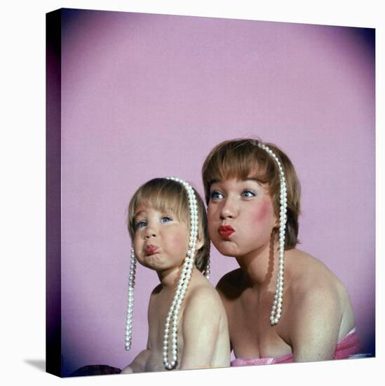 Actress Shirley MacLaine and Daughter Sachi Parker Pouting with String of Pearls on Their Heads-Allan Grant-Stretched Canvas