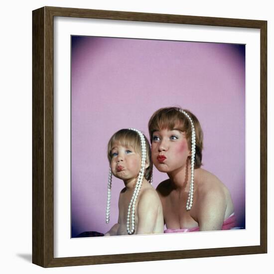 Actress Shirley MacLaine and Daughter Sachi Parker Pouting with String of Pearls on Their Heads-Allan Grant-Framed Premium Photographic Print