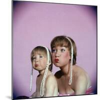 Actress Shirley MacLaine and Daughter Sachi Parker Pouting with String of Pearls on Their Heads-Allan Grant-Mounted Premium Photographic Print