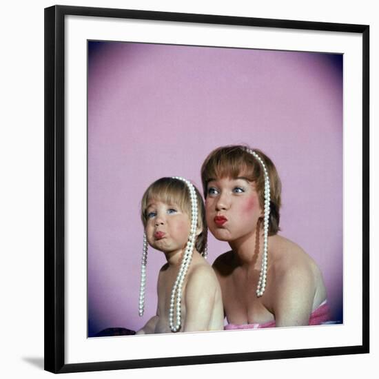 Actress Shirley MacLaine and Daughter Sachi Parker Pouting with String of Pearls on Their Heads-Allan Grant-Framed Premium Photographic Print